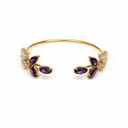 Marvel Silver gold-plated open cuff kada featuring purple marquise-cut crystal leaf motifs and sparkling Cubic Zirconia floral accents, designed for women and girls, perfect for weddings, parties, festive occasions, office wear, daily wear, and gifting.