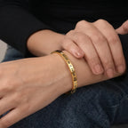 Marvel Silver gold-plated Roman numeral engraved kada bracelet featuring sparkling Cubic Zirconia stone accents with a secure hinged lock, designed for women and girls, perfect for daily wear, office, parties, weddings, festive occasions, and gifting.