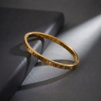 Marvel Silver gold-plated Roman numeral engraved kada bracelet featuring sparkling Cubic Zirconia stone accents with a secure hinged lock, designed for women and girls, perfect for daily wear, office, parties, weddings, festive occasions, and gifting.