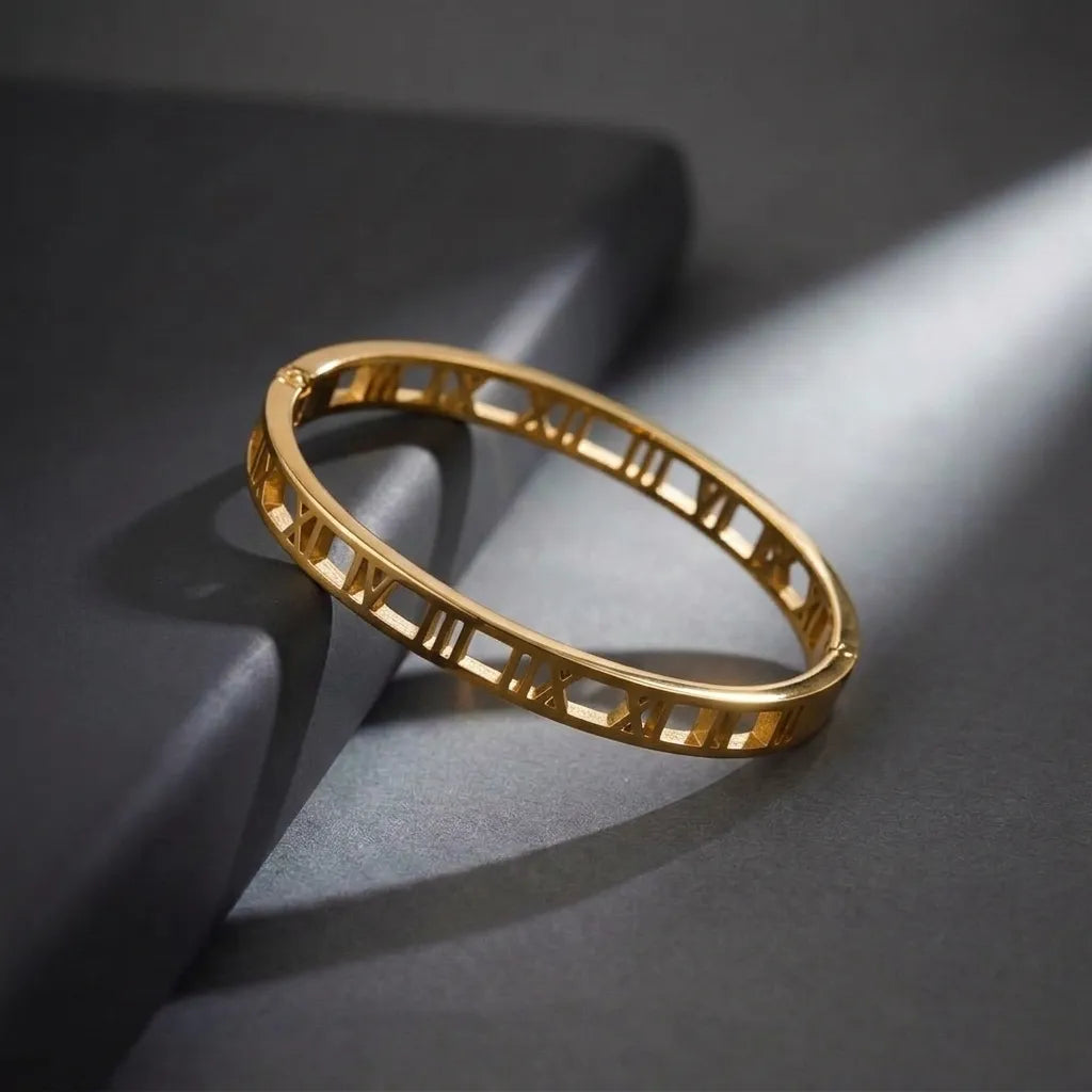 Marvel Silver gold-plated Roman numeral cutwork kada bracelet for women and girls featuring a sleek minimalist open design with a secure hinged closure, ideal for daily wear, office, parties, weddings, festive occasions, and gifting.