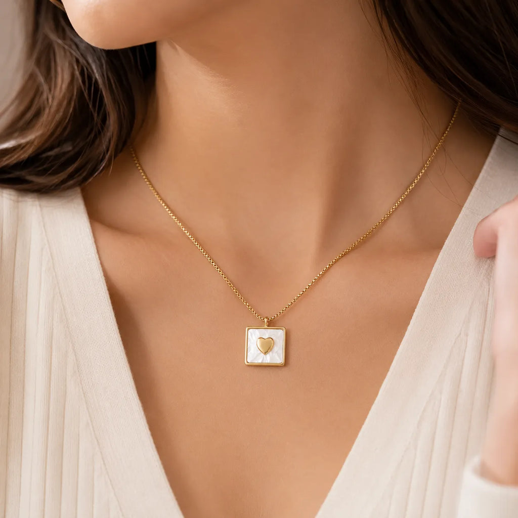 Marvel Silver gold-plated square white shell heart pendant necklace for women and girls on a delicate gold chain with minimalist design.