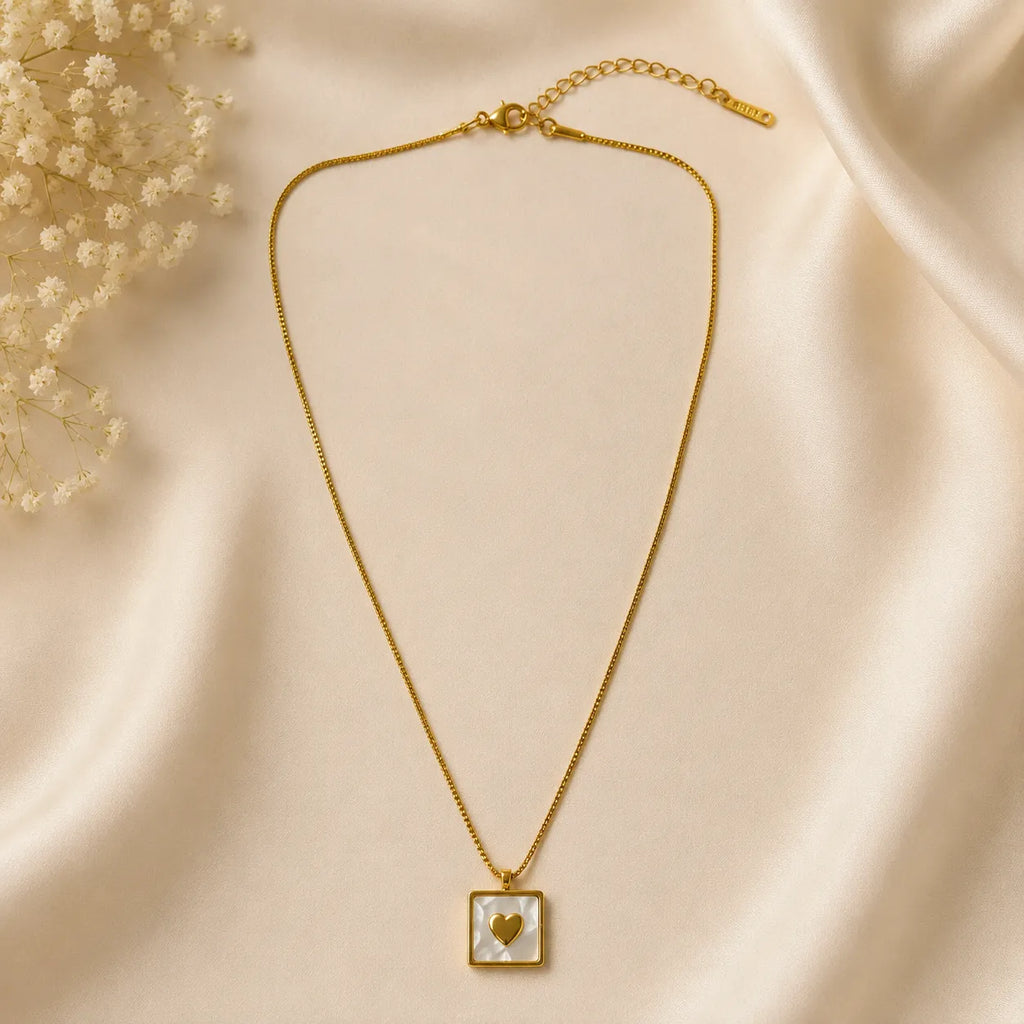 Marvel Silver gold-plated square white shell heart pendant necklace for women and girls on a delicate gold chain with minimalist design.