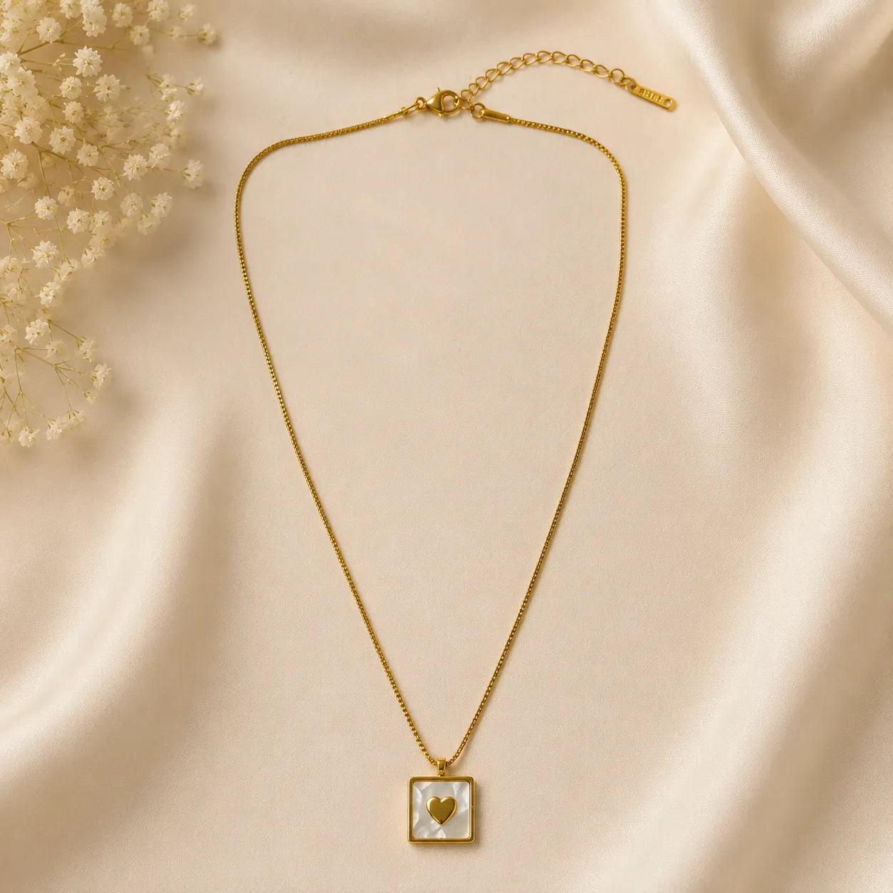Marvel Silver gold-plated square white shell heart pendant necklace for women and girls on a delicate gold chain with minimalist design.
