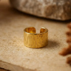 Marvel Silver gold-plated textured adjustable wide band ring for women and girls featuring an engraved pattern with a premium polished finish and open adjustable design.
