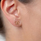 Marvel Silver 9K gold butterfly outline stud earrings for women and girls, lightweight minimalist gold earrings for everyday and festive wear.