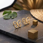 Marvel Silver 9K gold butterfly outline stud earrings for women and girls, lightweight minimalist gold earrings for everyday and festive wear.