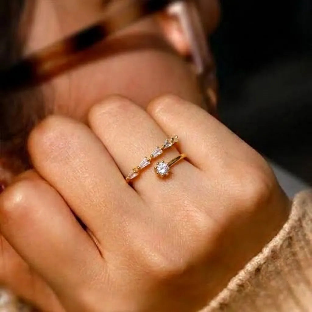 Marvel Silver gold plated adjustable open imitation ring featuring baguette, marquise, and round-cut cubic zirconia stones for women and girls.