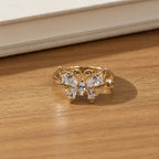 Marvel Silver gold plated adjustable butterfly crystal ring for girls featuring marquise and pear-cut cubic zirconia stones with an elegant open-band design.