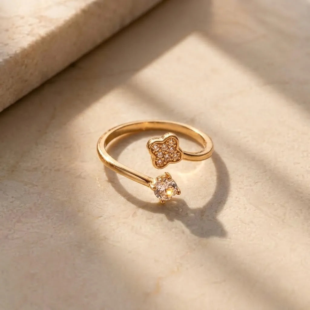Marvel Silver gold plated adjustable clover imitation ring featuring sparkling cubic zirconia stones with a solitaire CZ accent for women and girls.