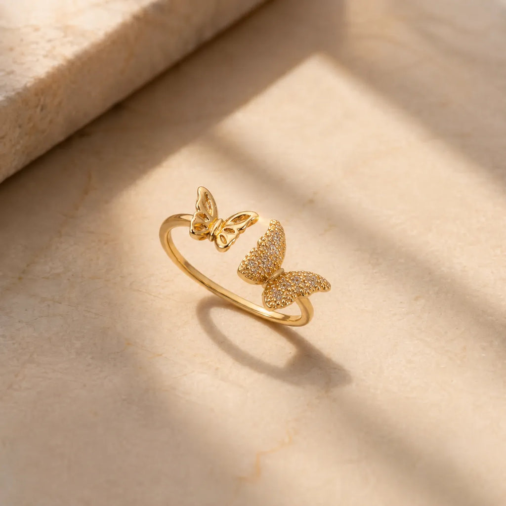 Marvel Silver gold plated double butterfly adjustable ring for girls featuring sparkling cubic zirconia stones and an elegant open-band design.