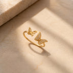 Marvel Silver gold plated double butterfly adjustable ring for girls featuring sparkling cubic zirconia stones and an elegant open-band design.