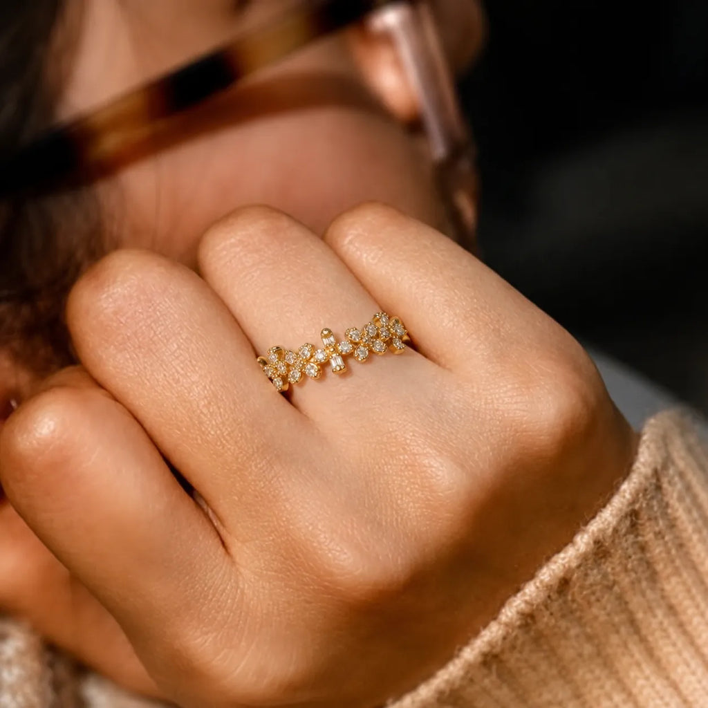 Marvel Silver gold plated adjustable floral crystal ring for girls featuring sparkling flower-shaped cubic zirconia stones in an elegant open-band design.