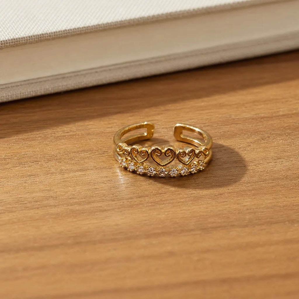 Marvel Silver gold plated adjustable heart crystal ring for girls with elegant open heart design and sparkling stones.