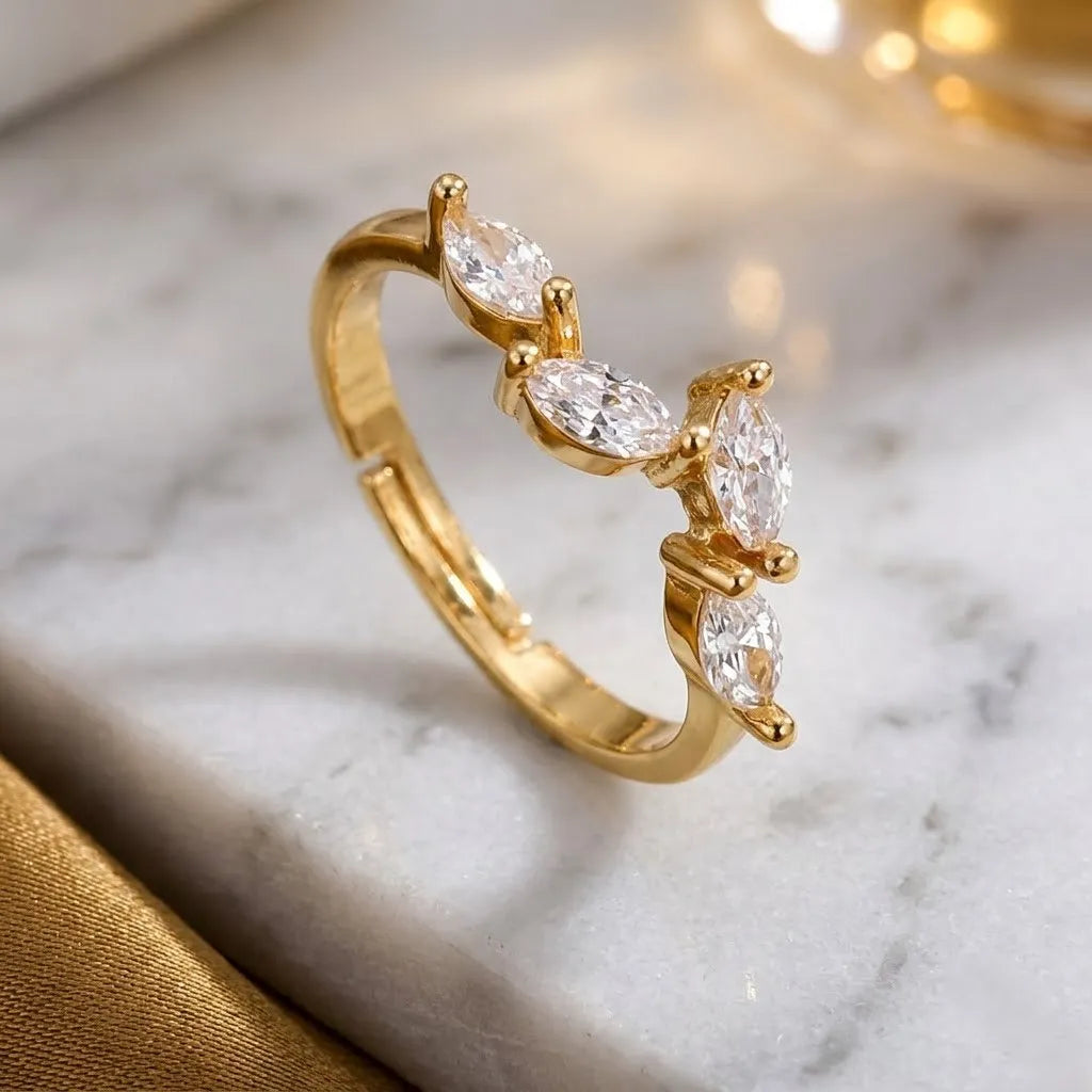Marvel Silver gold plated adjustable marquise crystal ring for girls featuring sparkling marquise-cut cubic zirconia stones in an elegant open-band design.