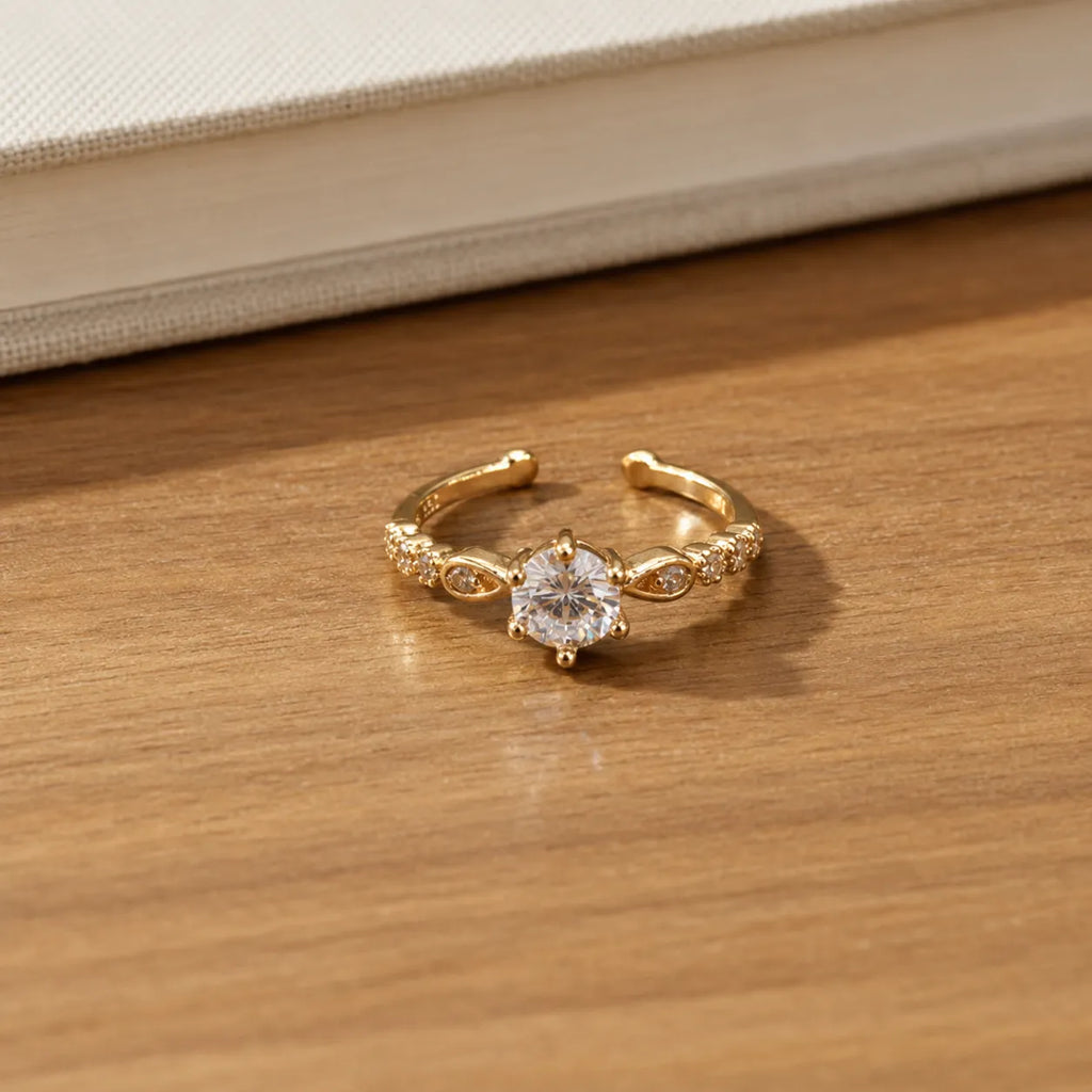 Marvel Silver gold plated adjustable solitaire crystal ring for girls featuring a sparkling round-cut cubic zirconia stone with elegant side crystal detailing.