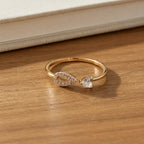 Marvel Silver gold plated adjustable teardrop crystal ring for girls featuring a sparkling open-band design with cubic zirconia stones.