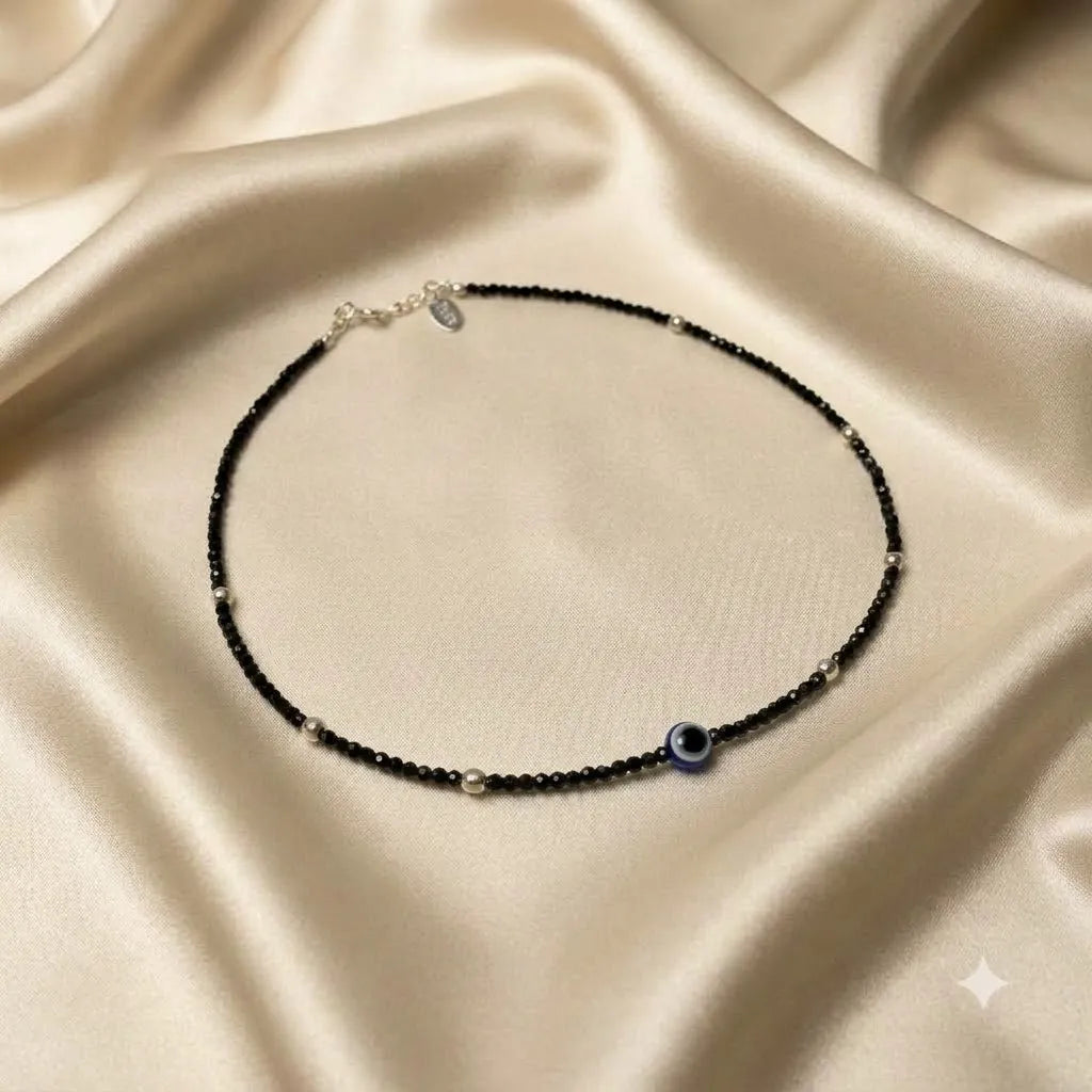 Marvel Silver Midnight Evil Eye Black Bead Silver Anklet for women and girls with blue evil eye motif, black beads and silver bead accents