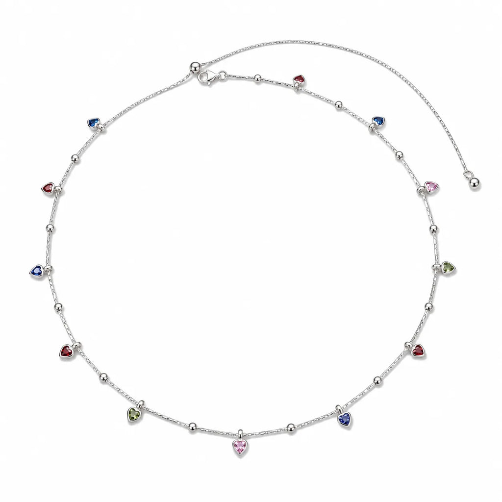Marvel Silver Multicolor Heart Charm Silver Waist Chain Kamarband Worn by Woman with Cream Embroidered Saree, Featuring Colourful Heart-Shaped Charms and Delicate Silver Bead Detailing