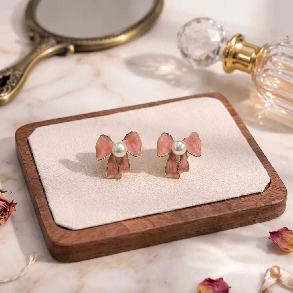 Marvel Silver Pink Enamel Bow Pearl Stud Earrings for Women with Gold-Tone Finish