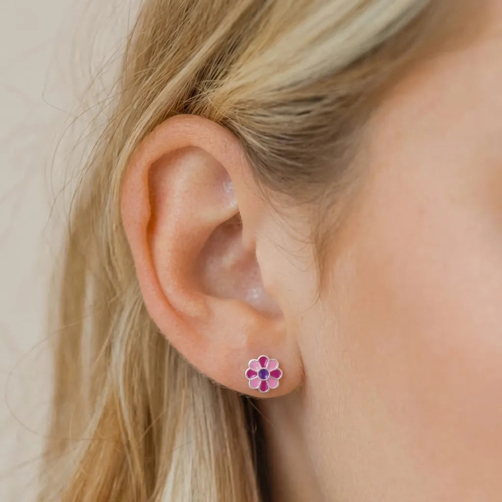 Marvel Silver pink daisy flower stud earrings featuring silver-plated finish, pink enamel petals, and a purple center, perfect for women and girls.