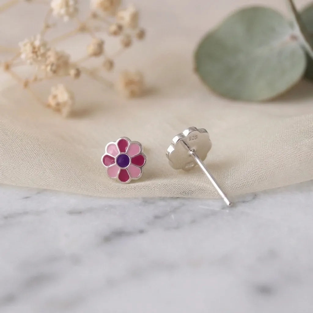 Marvel Silver pink daisy flower stud earrings featuring silver-plated finish, pink enamel petals, and a purple center, perfect for women and girls.