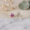 Marvel Silver pink daisy flower stud earrings featuring silver-plated finish, pink enamel petals, and a purple center, perfect for women and girls.