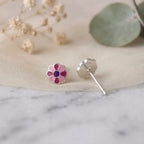 Marvel Silver pink daisy flower stud earrings featuring silver-plated finish, pink enamel petals, and a purple center, perfect for women and girls.