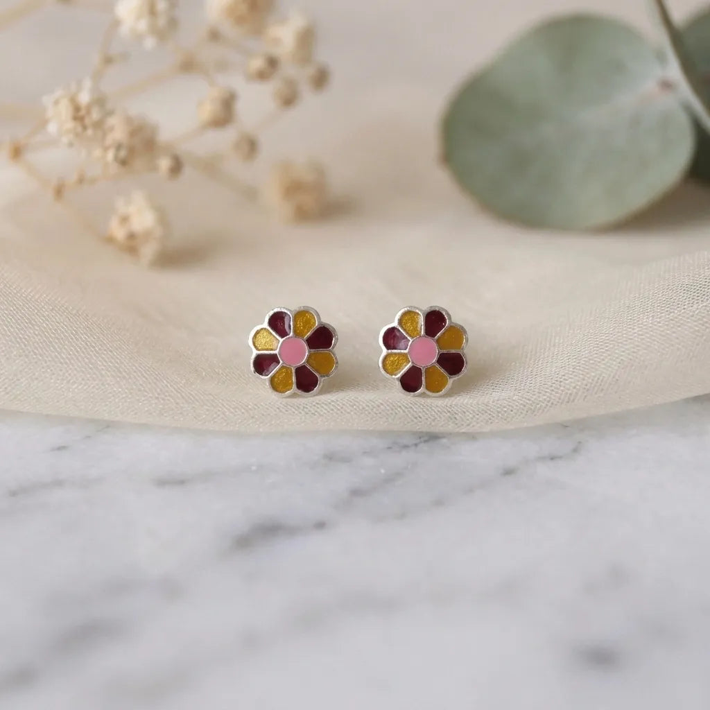 Marvel Silver pink daisy flower stud earrings featuring silver-plated finish, pink enamel petals, and a purple center, perfect for women and girls.