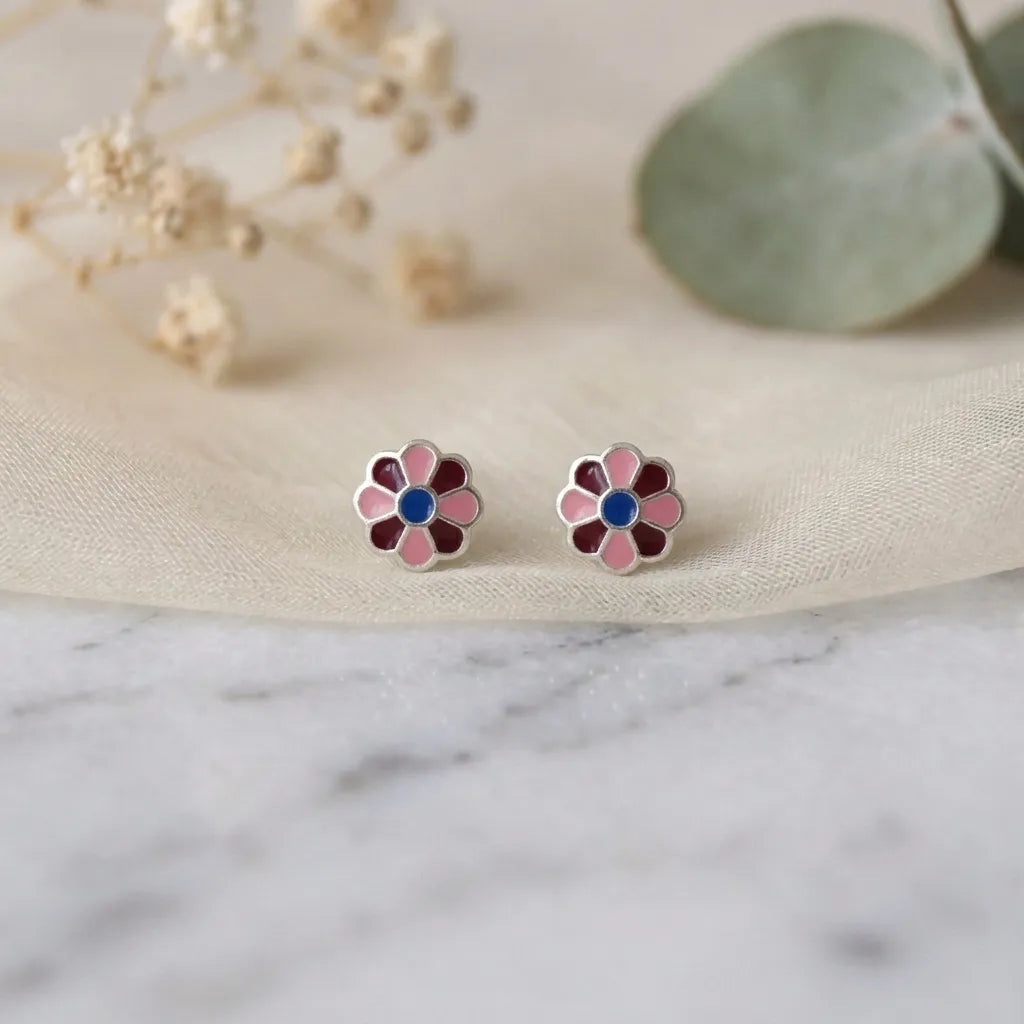 Marvel Silver pink daisy flower stud earrings featuring silver-plated finish, pink enamel petals, and a purple center, perfect for women and girls.