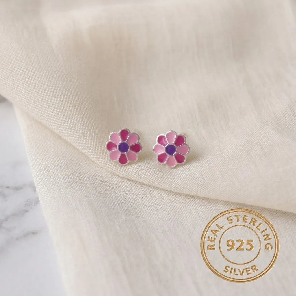 Marvel Silver pink daisy flower stud earrings featuring silver-plated finish, pink enamel petals, and a purple center, perfect for women and girls.