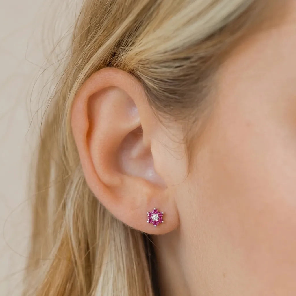 Marvel Silver pink floral crystal stud earrings for women and girls featuring sparkling pink petals, a brilliant white center stone, and a premium silver-plated finish.