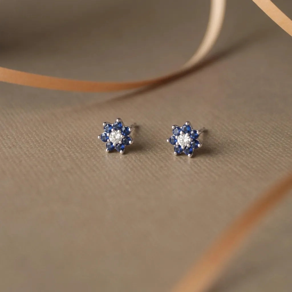 Marvel Silver pink floral crystal stud earrings for women and girls featuring sparkling pink petals, a brilliant white center stone, and a premium silver-plated finish.