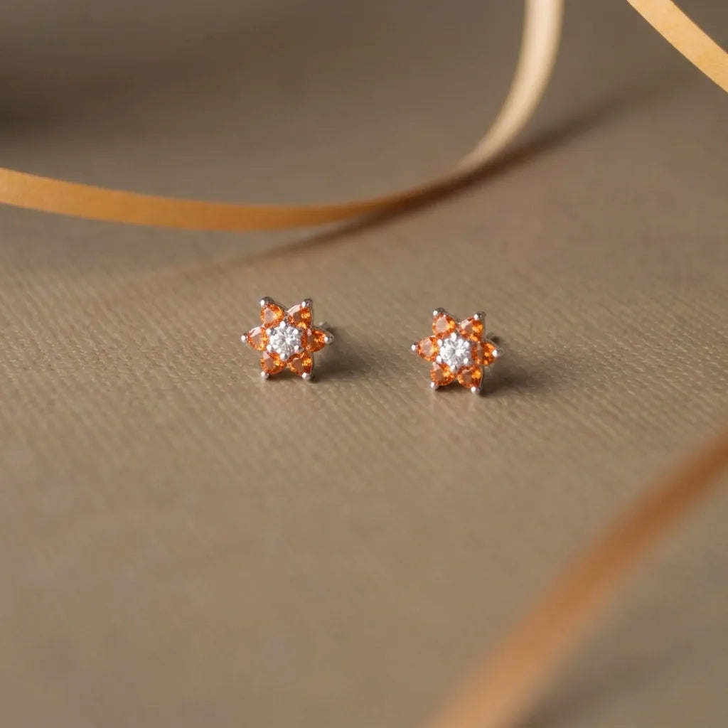 Marvel Silver pink floral crystal stud earrings for women and girls featuring sparkling pink petals, a brilliant white center stone, and a premium silver-plated finish.