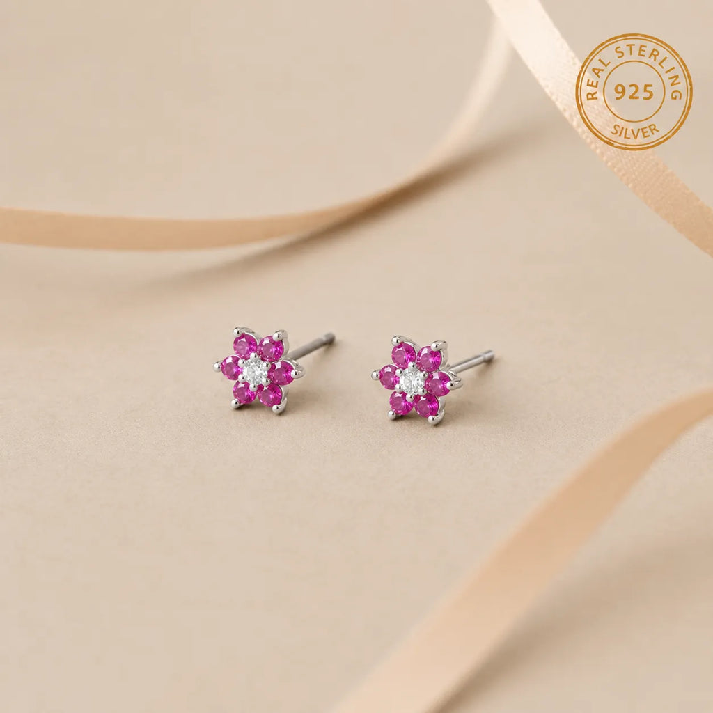 Marvel Silver pink floral crystal stud earrings for women and girls featuring sparkling pink petals, a brilliant white center stone, and a premium silver-plated finish.