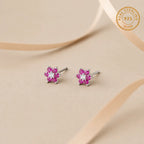 Marvel Silver pink floral crystal stud earrings for women and girls featuring sparkling pink petals, a brilliant white center stone, and a premium silver-plated finish.
