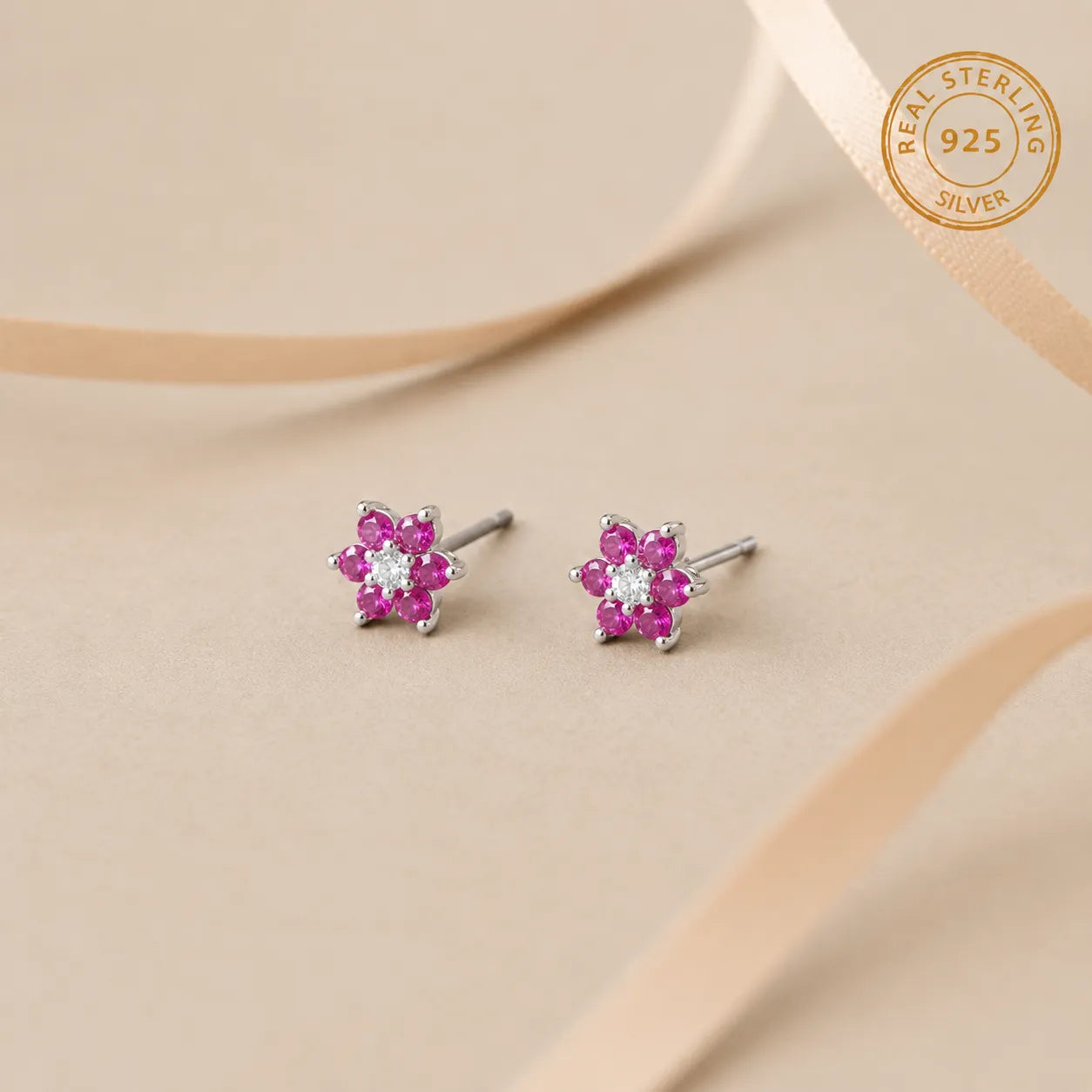 Marvel Silver pink floral crystal stud earrings for women and girls featuring sparkling pink petals, a brilliant white center stone, and a premium silver-plated finish.