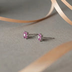 Marvel Silver pink floral crystal stud earrings for women and girls featuring sparkling pink petals, a brilliant white center stone, and a premium silver-plated finish.