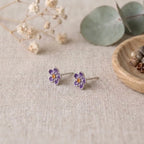 Marvel Silver purple floral enamel stud earrings with crystal accents and an amber centre, silver-plated flower earrings for women and girls.