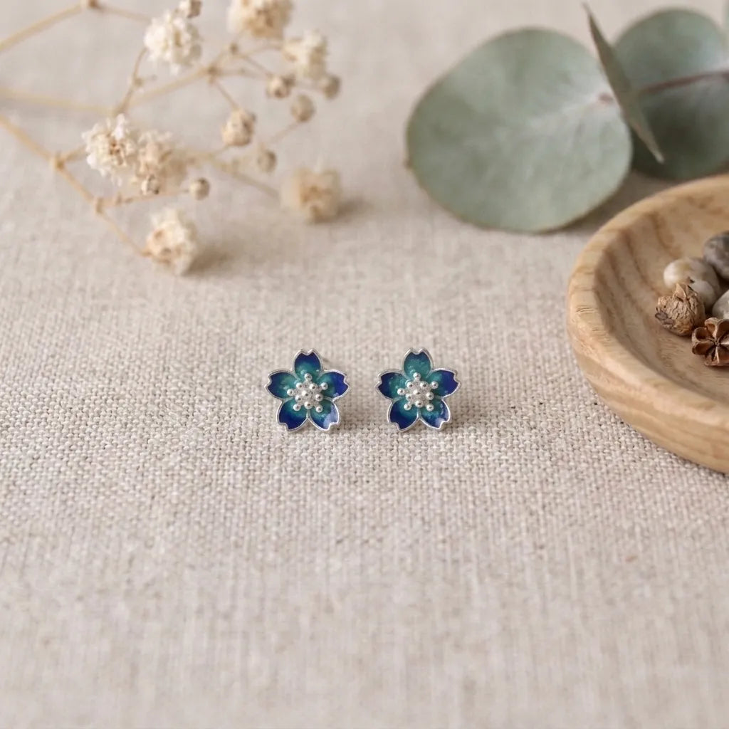 Marvel Silver purple floral enamel stud earrings with crystal accents and an amber centre, silver-plated flower earrings for women and girls.