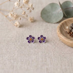 Marvel Silver purple floral enamel stud earrings with crystal accents and an amber centre, silver-plated flower earrings for women and girls.