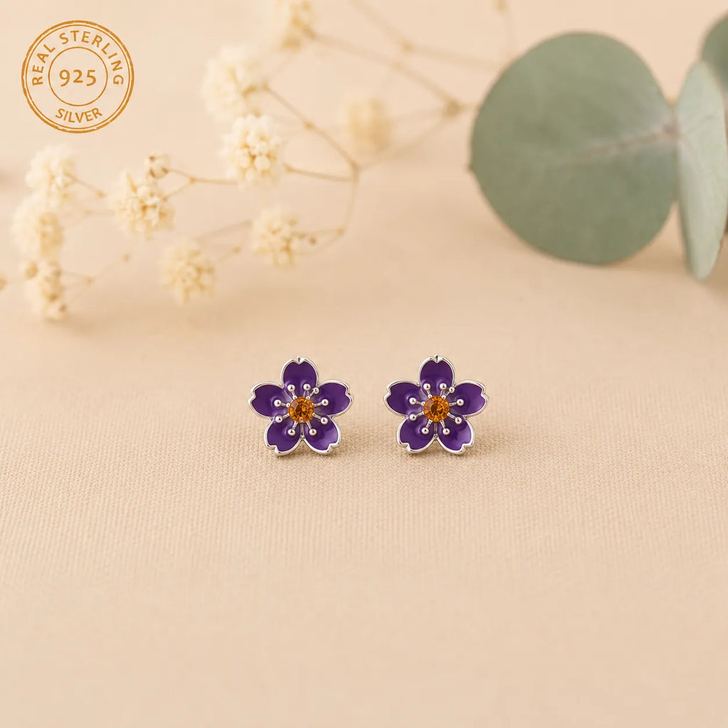 Marvel Silver purple floral enamel stud earrings with crystal accents and an amber centre, silver-plated flower earrings for women and girls.