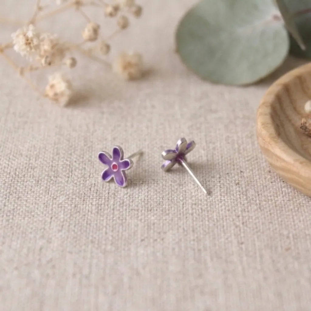 Marvel Silver purple floral enamel stud earrings for women and girls featuring a five-petal flower design with a pink centre and premium silver-plated finish.