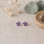 Marvel Silver purple floral enamel stud earrings for women and girls featuring a five-petal flower design with a pink centre and premium silver-plated finish.