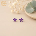 Marvel Silver purple floral enamel stud earrings for women and girls featuring a five-petal flower design with a pink centre and premium silver-plated finish.
