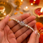 Marvel Silver Ram Name Silver Rakhi with White Pearl Beads, Purple CZ Stone Charm and Designer Thread for Raksha Bandhan