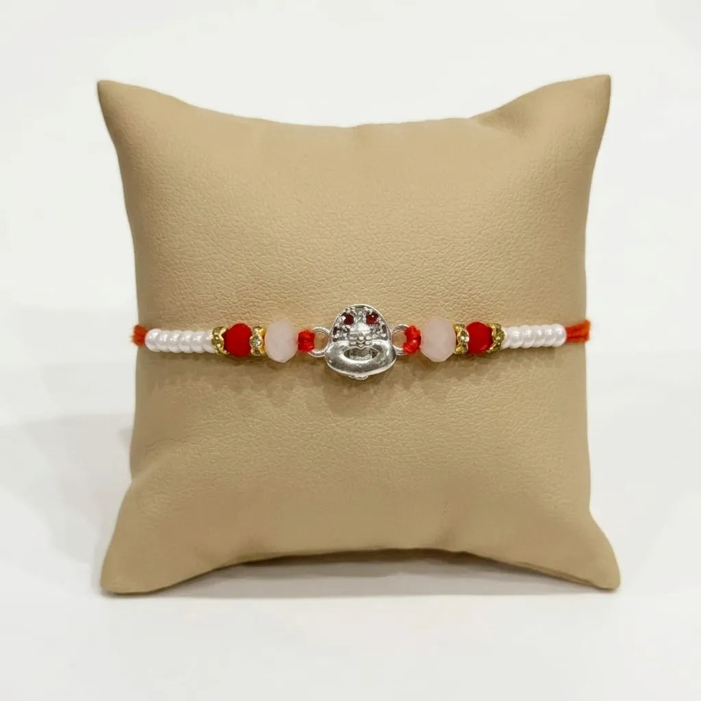 Marvel Silver Shivling Silver Rakhi with Red Crystal Beads, White Pearl Beads and Premium Silver Shivling Charm for Raksha Bandhan