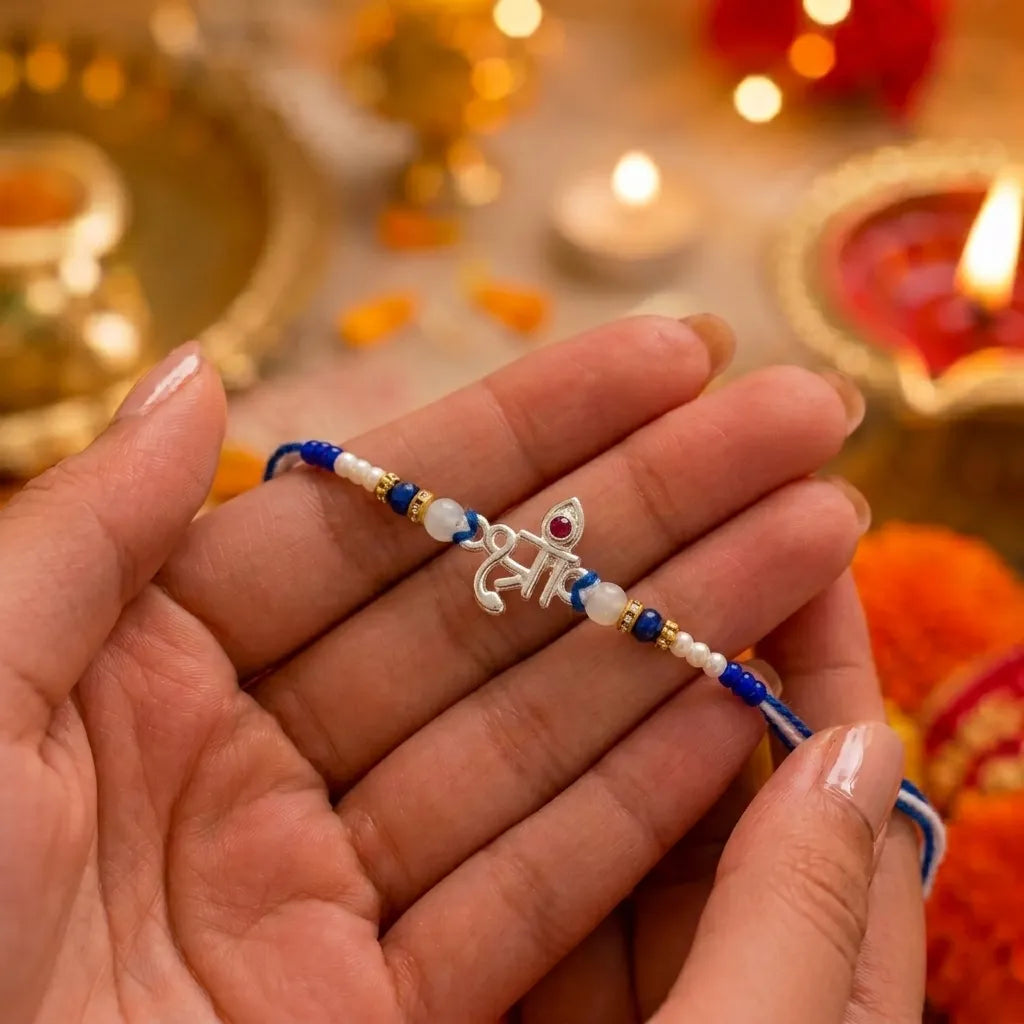 Marvel Silver Shree Silver Rakhi with Blue Beads, White Crystal Beads, Pearl Beads and Red CZ Stone for Raksha Bandhan