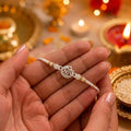 Marvel Silver Shree Silver Rakhi with White Crystal Beads, White Pearl Beads and Sparkling Silver Shree Symbol for Raksha Bandhan