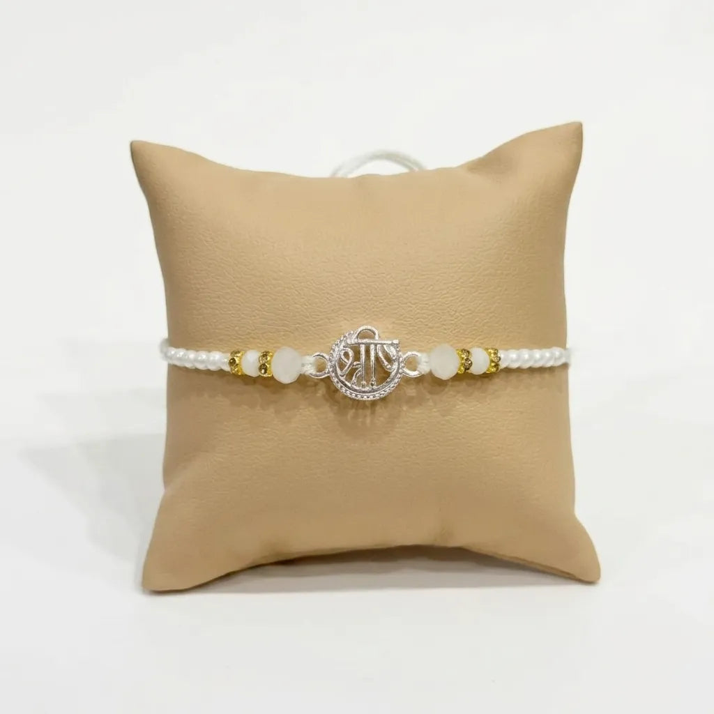 Marvel Silver Shree Silver Rakhi with White Crystal Beads, White Pearl Beads and Sparkling Silver Shree Symbol for Raksha Bandhan