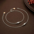 Marvel Silver adjustable silver anklet for women with textured barrel center bead and polished round bead accents